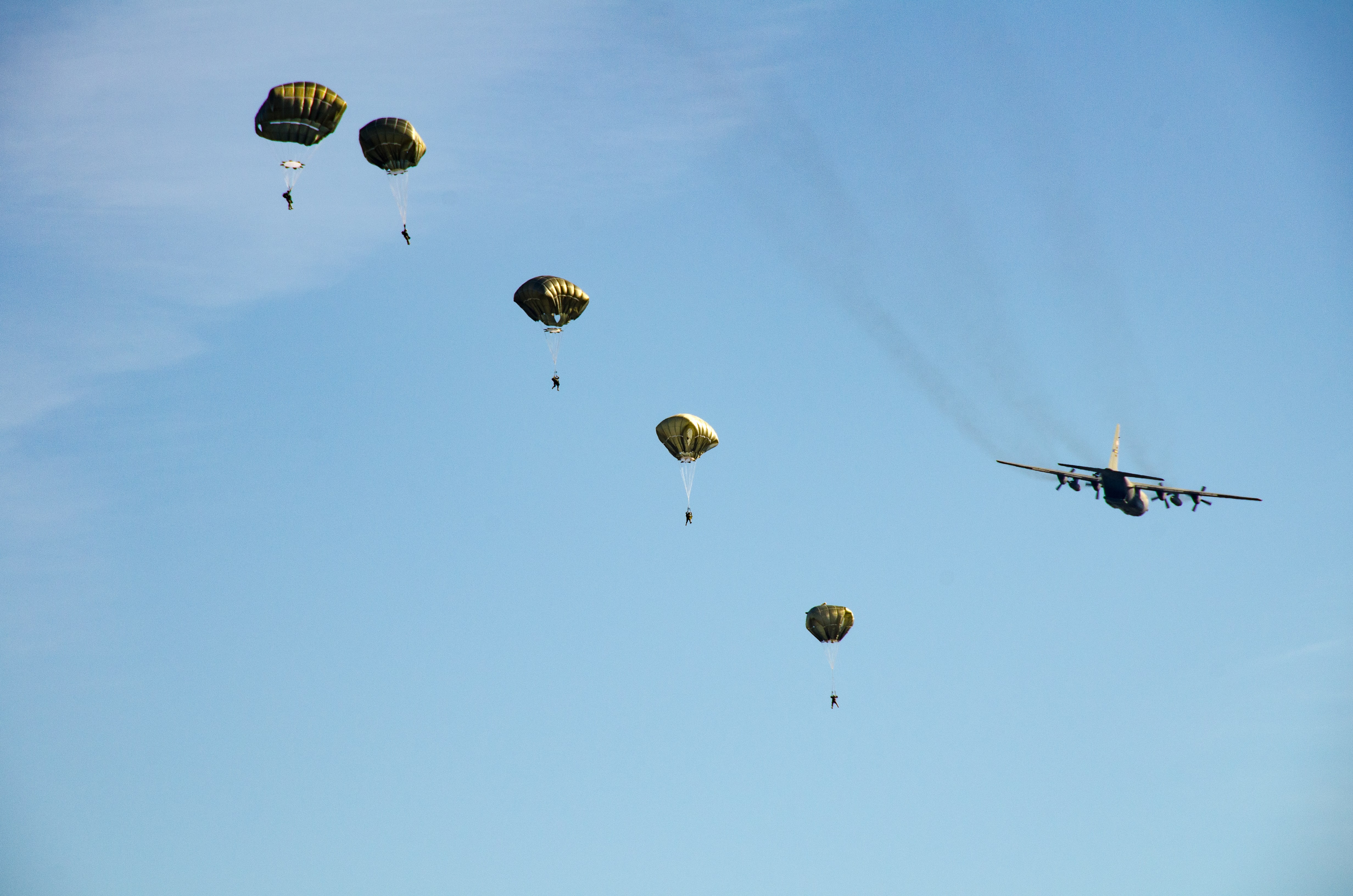 Paratroopers jumping from a plane
